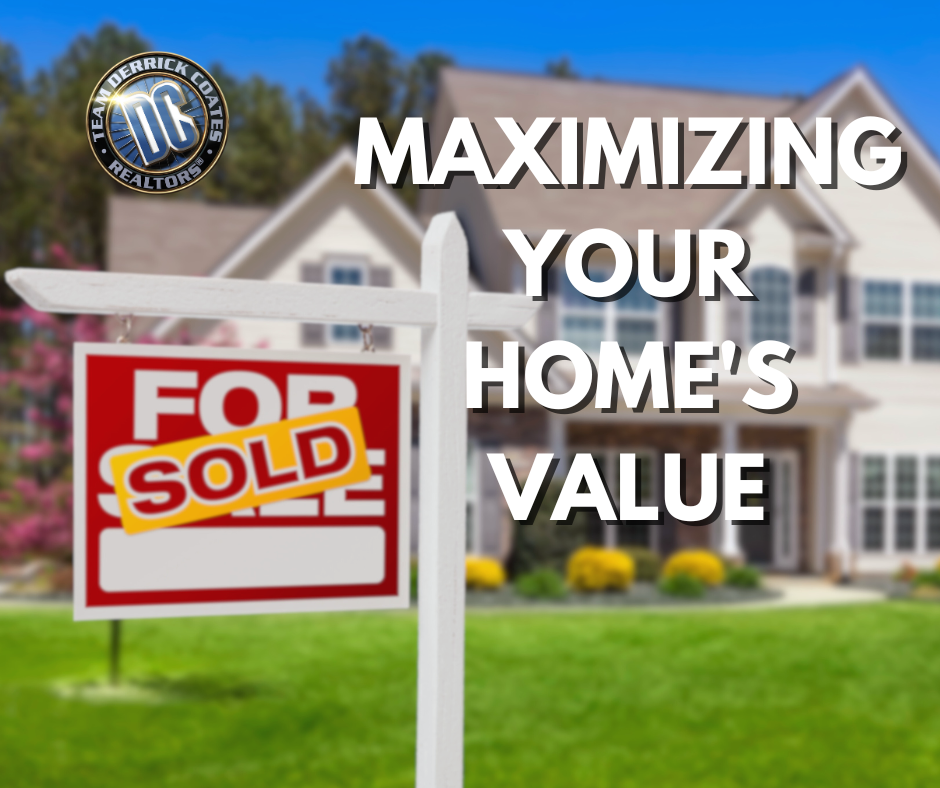 Photo of For Sale sign overlaid with SOLD sign in front of 2 story brown and tan home with green grass yard.